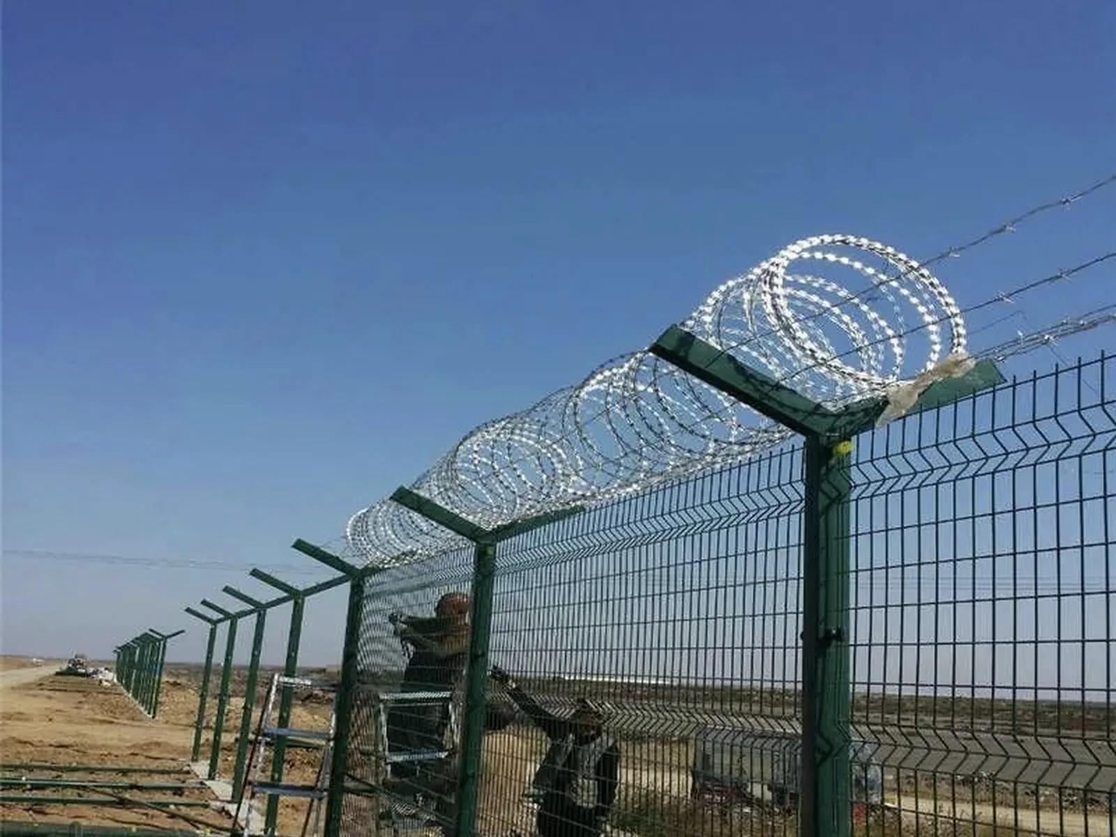 Concertina Razor Wire Security Topping installed in a suitable perimeter application